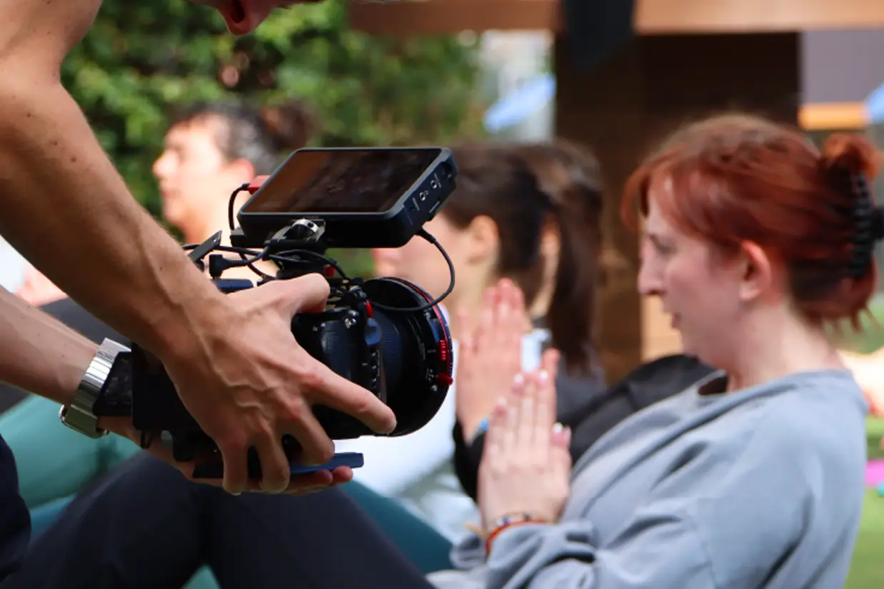 Social media marketing in action: A behind-the-scenes photo of the SourBatch Social team filming video content for a lululemon event.